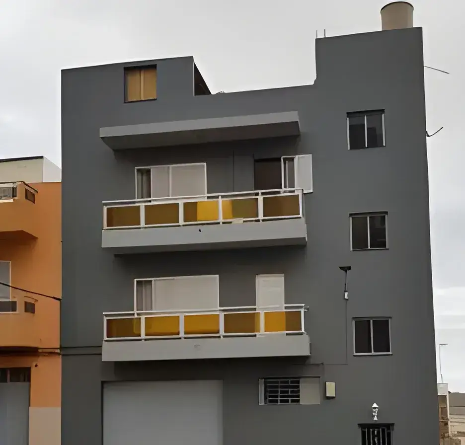 El Pintor en Cádiz Rehabilitación y pintado de fachada de comunidad en color gris moderno